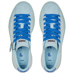 Puma Light blue sneakers with blue laces on a white background