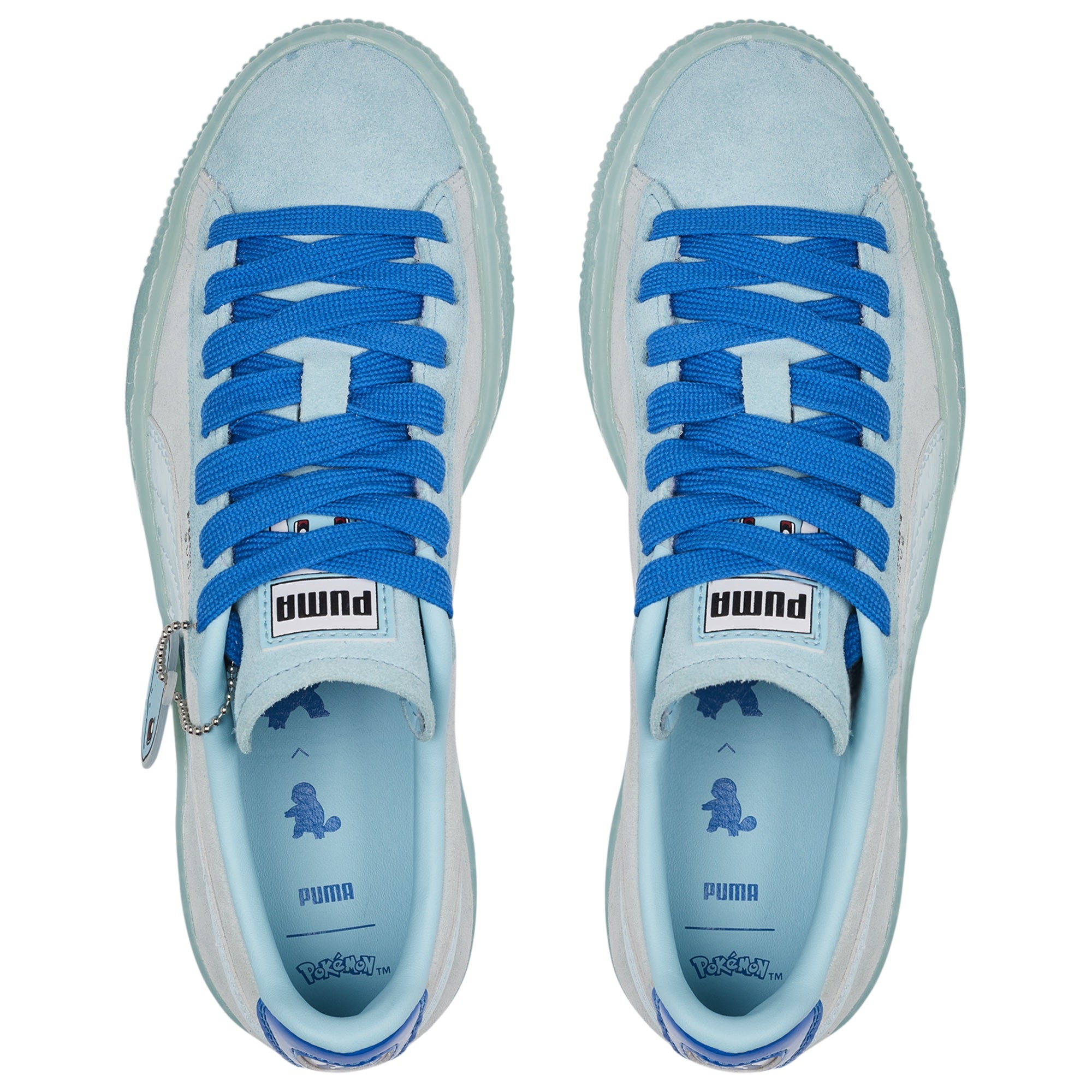 Puma Light blue sneakers with blue laces on a white background