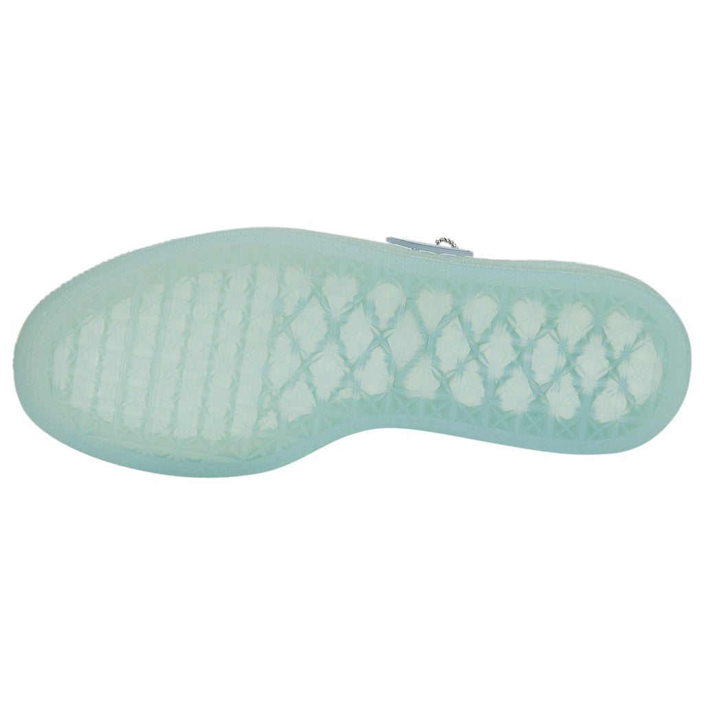 Light blue shoe sole with textured pattern on a white background