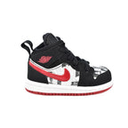 Lateral view of Jordan 1 Mid SE TD 'Newspaper' showing the black nubuck and headline print.