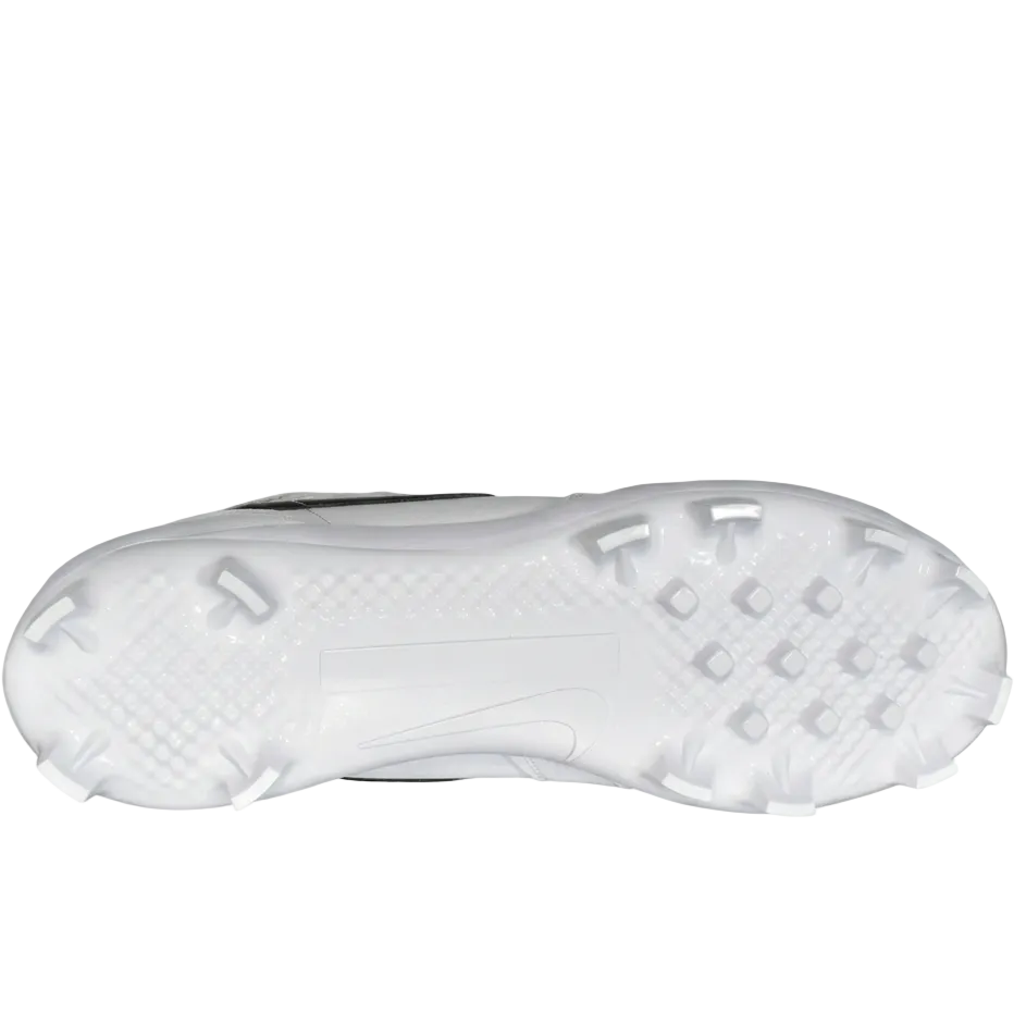 Underneath view of Jordan 1 Retro MCS showing the 12-cleat molded traction pattern.