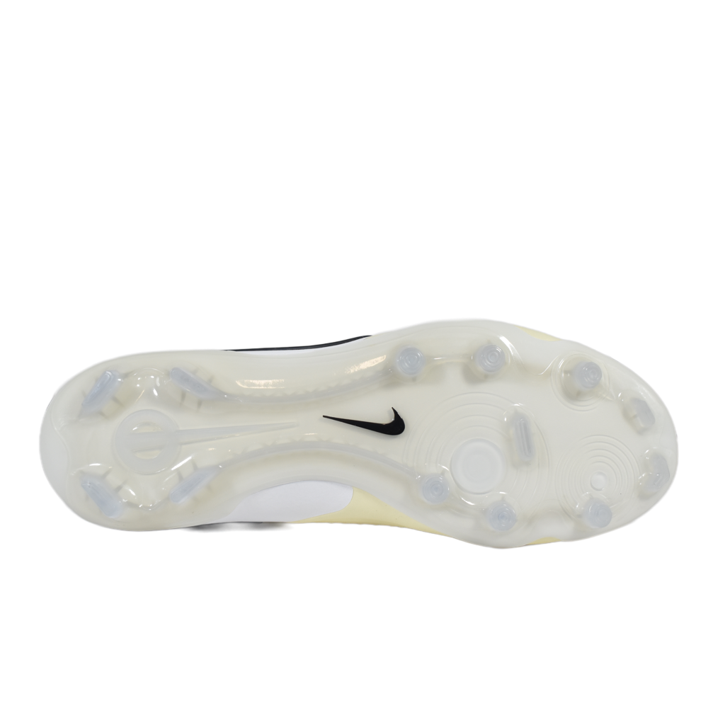 Bottom view of the Nike Air Zoom Victory outsole plate, revealing the stiff carbon fiber Flyplate and the data-driven traction pattern with removable stainless steel track spikes