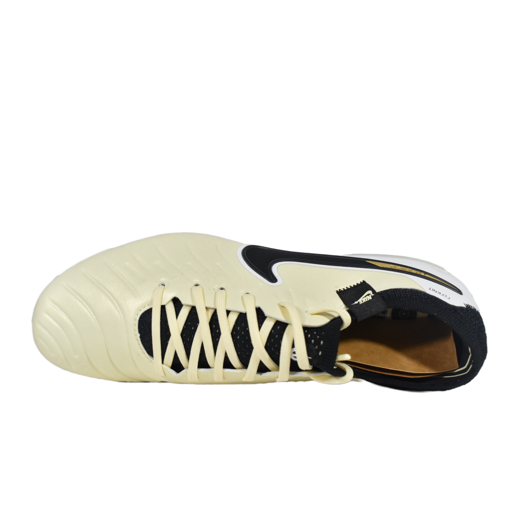 Top-down aerial perspective of the Nike Air Zoom Victory distance spikes, showing the asymmetrical lacing system and the streamlined silhouette designed for mid-distance track events.