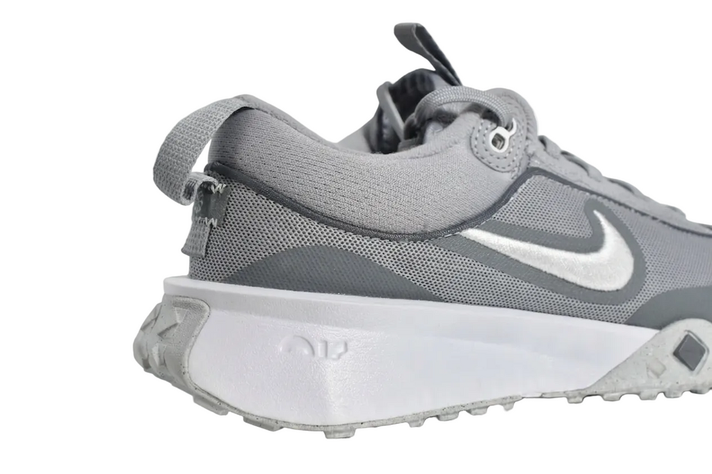 Perspective angle of the Air Diamond Varsity Turf 'Wolf Grey' athletic trainer.