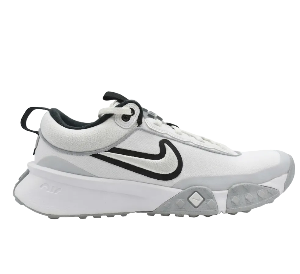 Lateral profile of the Air Diamond Varsity Turf shoe in White and Black.