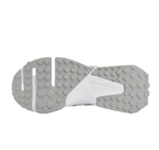 Close-up of the rubber nubbed outsole for multi-surface turf traction.