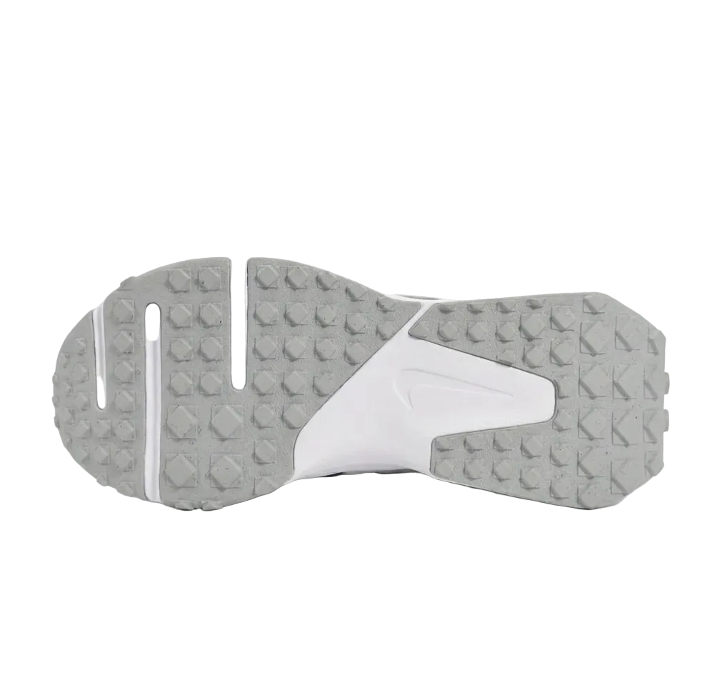 Close-up of the rubber nubbed outsole for multi-surface turf traction.