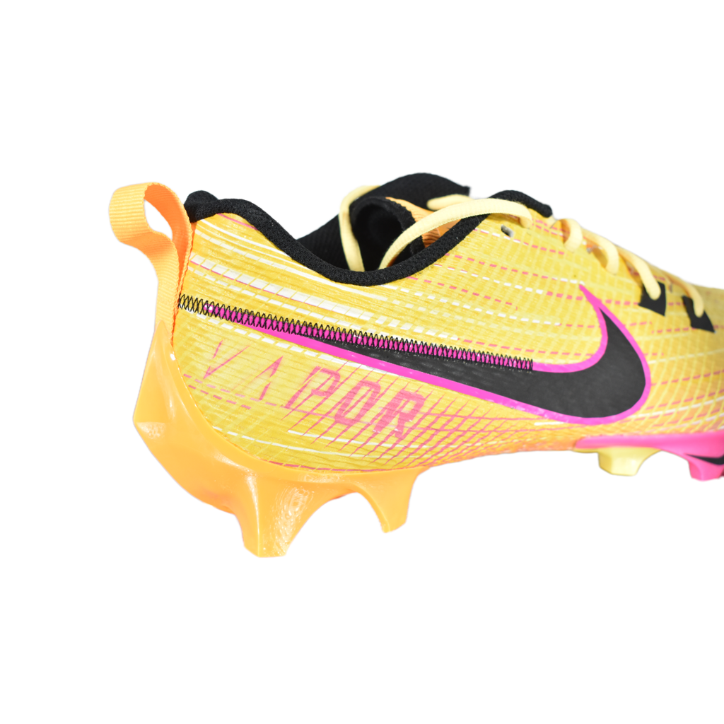 Yellow soccer cleat with black and pink accents on a white background FZ6209-800