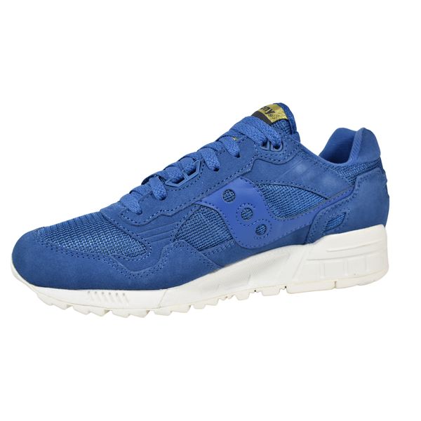 Medial view of Saucony Shadow 5000 showing the layered paneling and cushioned white EVA midsole.