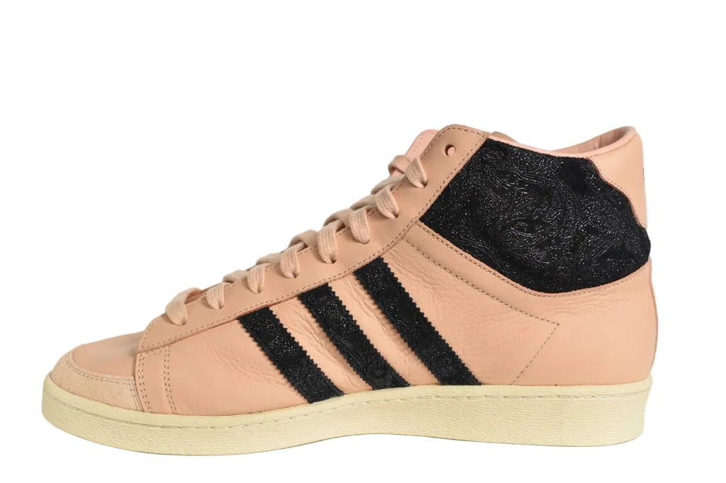 Alternate medial side view of Adidas Jabbar Hi Made in LA Off White showing inner leather panel.