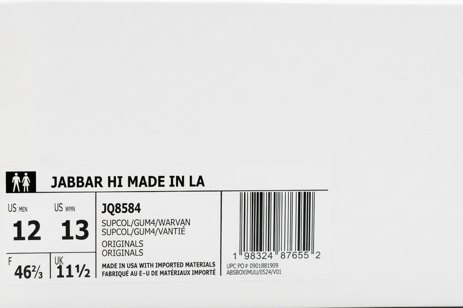 A white shoebox showing the back side with size information for 'JABBAR HI' in LA, including US sizes 12 and 13, height 11 1/2, and a barcode JQ8584.