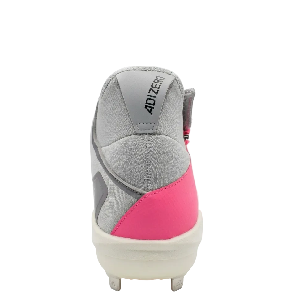 Close up view of the adizero Impact+ BSB Pink and Core Black cleats for baseball performance