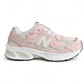 Lateral side view of the New Balance 2010 Big Kids sneaker in style code G201038W featuring a diamond mesh base and chunky ABZORB cushioned midsole.