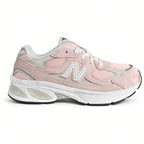 Lateral side view of the New Balance 2010 Big Kids sneaker in style code G201038W featuring a diamond mesh base and chunky ABZORB cushioned midsole.