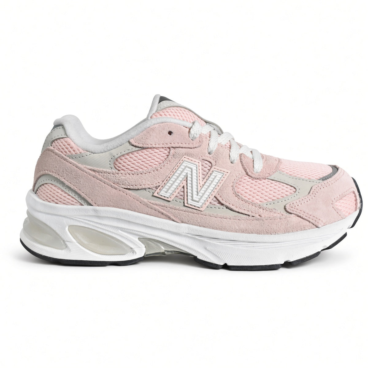 Lateral side view of the New Balance 2010 Big Kids sneaker in style code G201038W featuring a diamond mesh base and chunky ABZORB cushioned midsole.