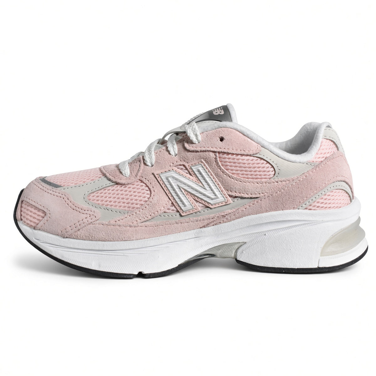 Lateral side view of the New Balance 2010 Big Kids sneaker in style code G201038W featuring a diamond mesh base and chunky ABZORB cushioned midsole.