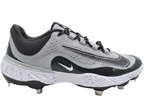 Nike Alpha Huarache Elite 4 Low Baseball Cleats in Wolf Grey and Dark Smoke Grey, showing the side profile and signature Nike Swoosh.