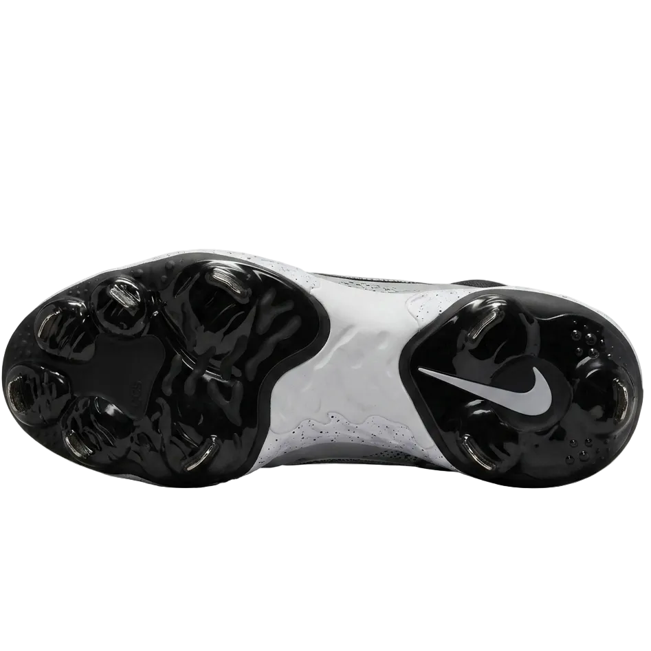 Close-up of the metal cleat plate on the Nike Alpha Huarache Elite 4 Low, highlighting the two-piece traction design for stability.