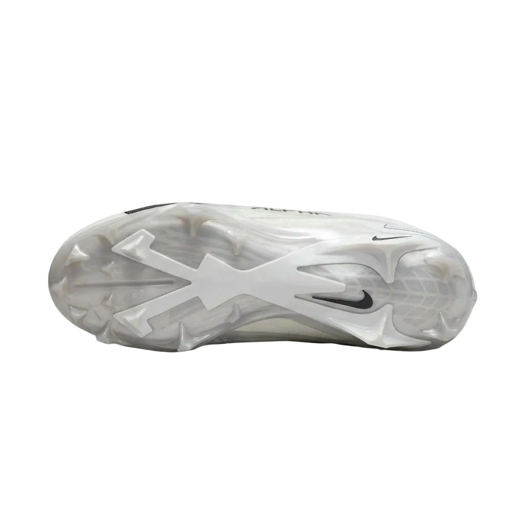 Bottom sole plate view of Nike Alpha Menace 4 Elite FD7036-100 displaying stud traction layout.