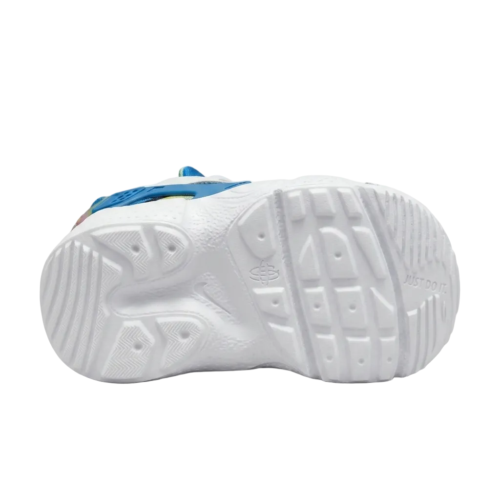 Bottom view of Nike Huarache E.D.G.E. Premium shoes showcasing the durable rubber outsole flex grooves and traction pattern, CD8172-700.