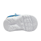 Bottom view of Nike Huarache E.D.G.E. Premium shoes showcasing the durable rubber outsole flex grooves and traction pattern, CD8172-700.