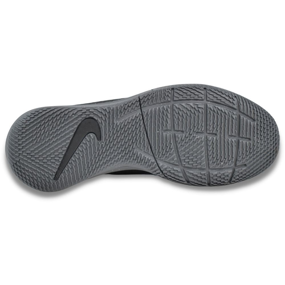 Bottom view of Nike Jr. Mercurial Superfly 8 Academy IC shoes showing the flat non-marking rubber outsole for indoor court traction, CV0784-004.