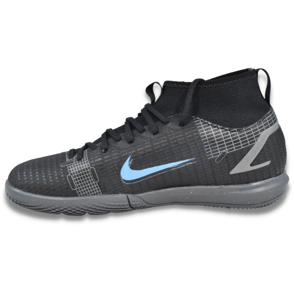 Left medial profile view of Nike Jr. Mercurial Superfly 8 Academy IC youth futsal shoes showcasing the textured ball control upper, CV0784-004.