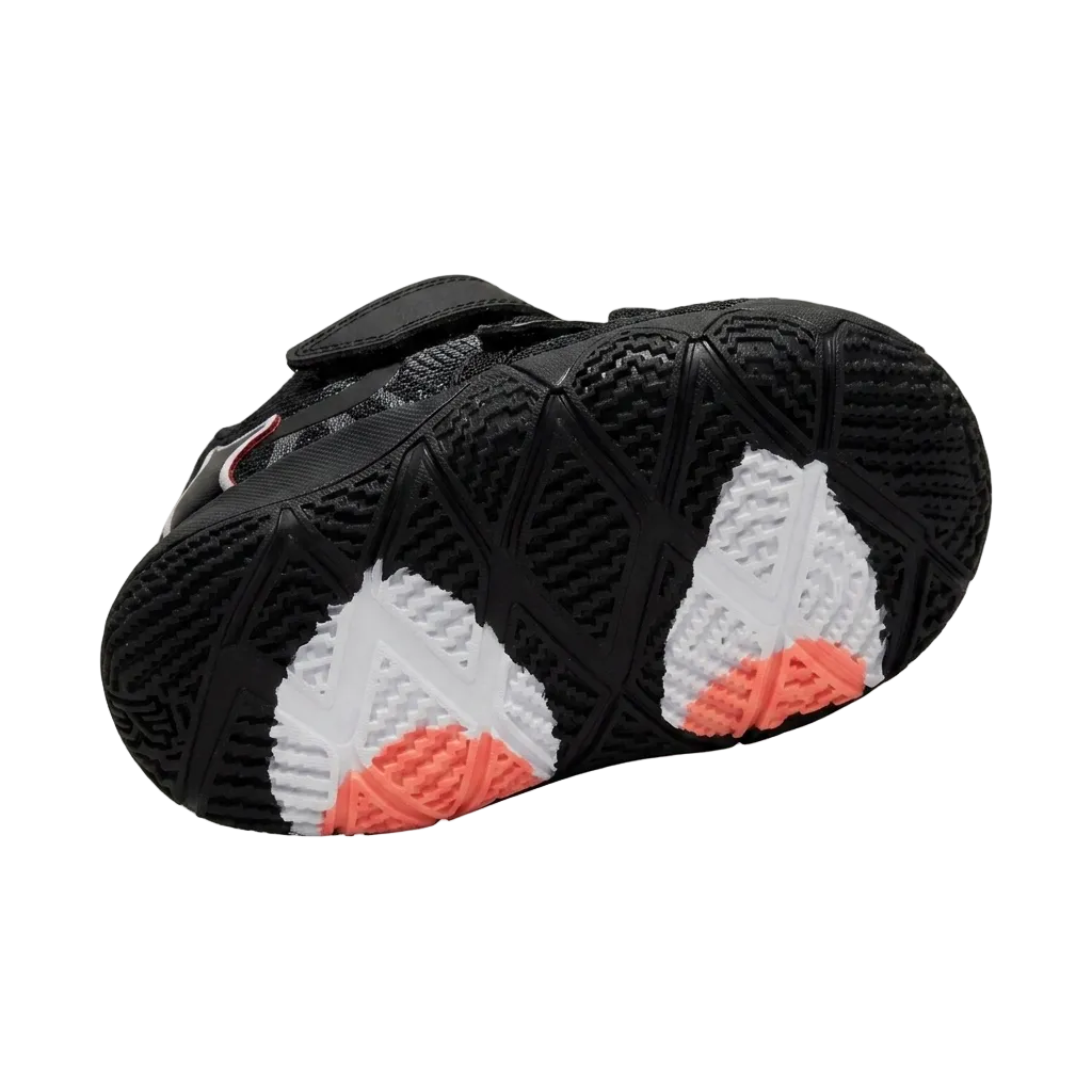 Bottom view of the rubber traction outsole on the toddler Nike Kybrid S2 What The shoe showing multi-directional grip circles.