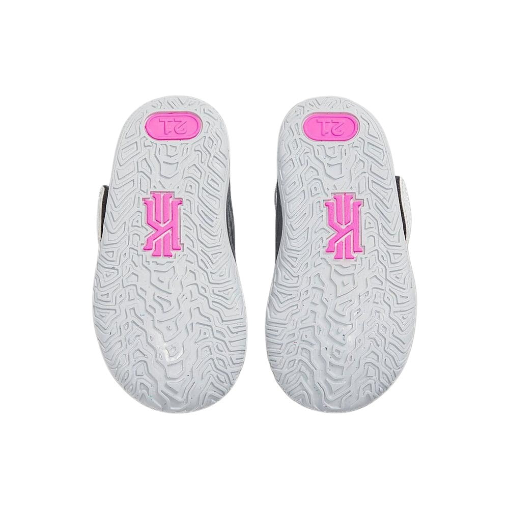 Bottom view of toddler Nike Kyrie 7 Pixel Camo sneakers showcasing the flexible rubber cupsole traction pattern, CT4980-008.