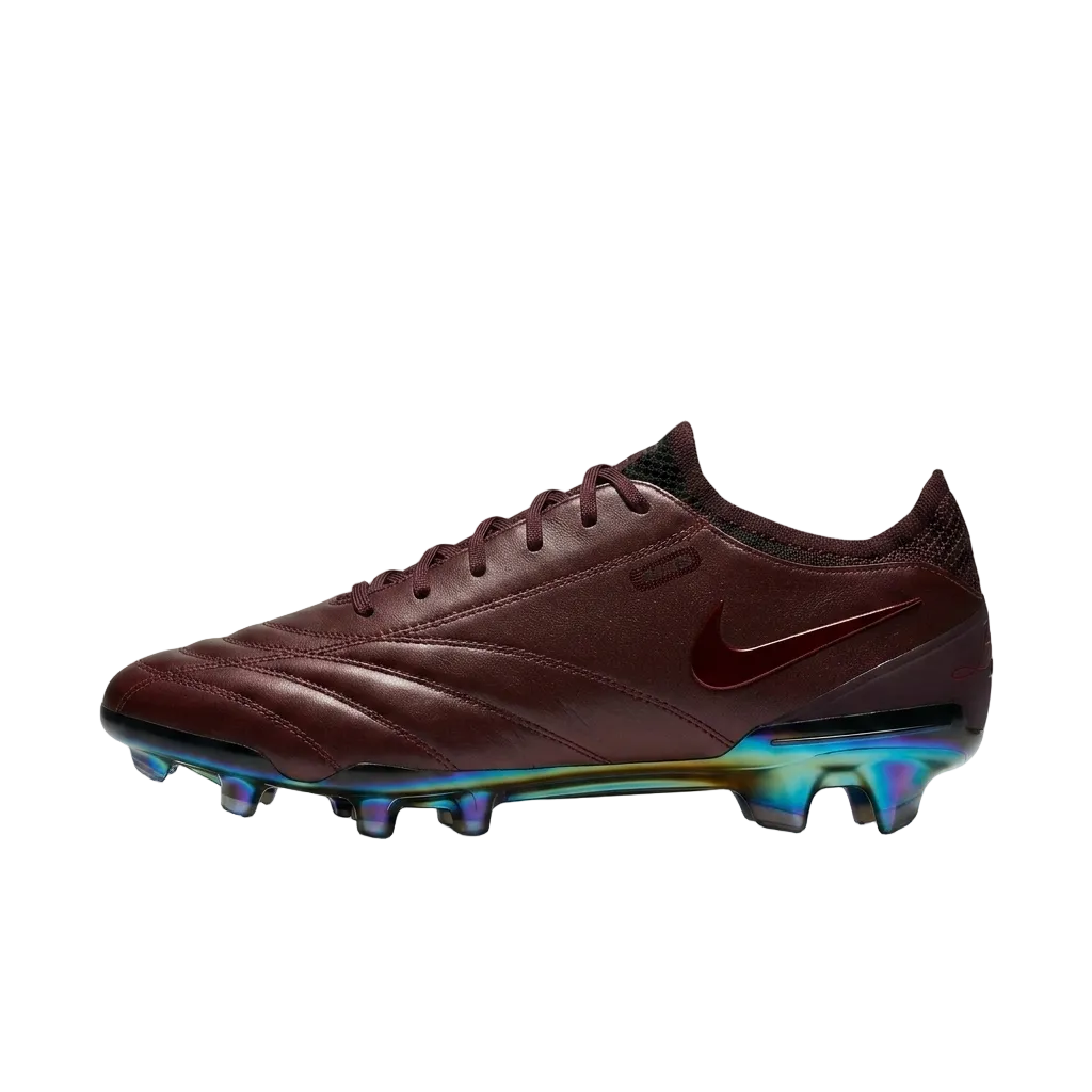 Side profile view of Nike Tiempo Legend 10 Elite Luxe FG cleats showcasing the premium Italian leather upper and metallic red ruby Swoosh, FZ1487-600.