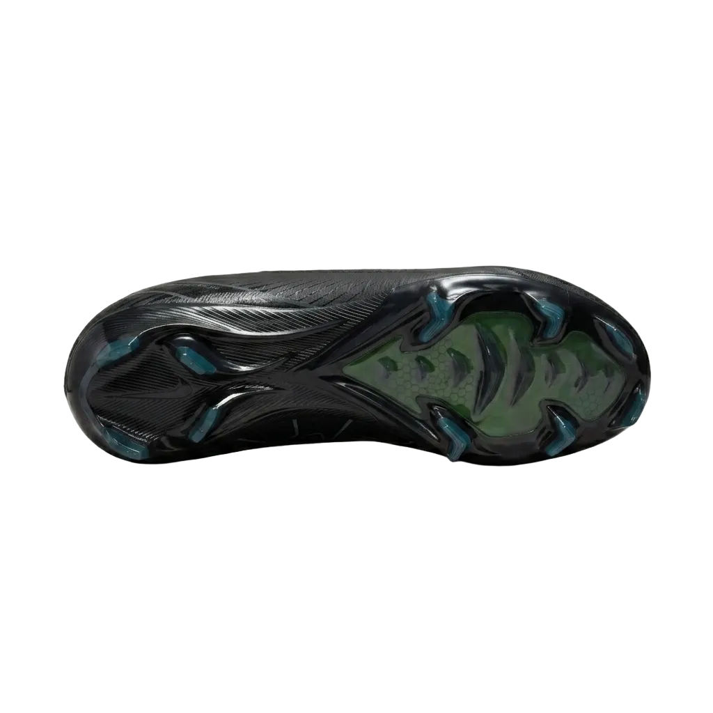 Bottom view of Nike Zoom Mercurial Vapor 16 Pro FG cleats showcasing the wave-like traction pattern and firm ground chevron studs, FQ8685-002.