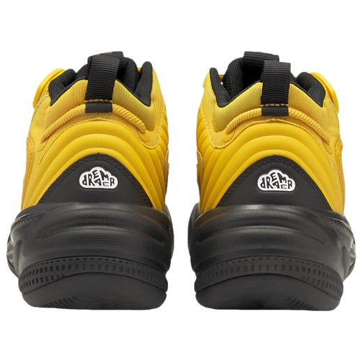 Close up view of the back heel of the J Cole Puma Dreamer 2 basketball shoe highlighting the signature Dreamer emblem and black ProFoam midsole.